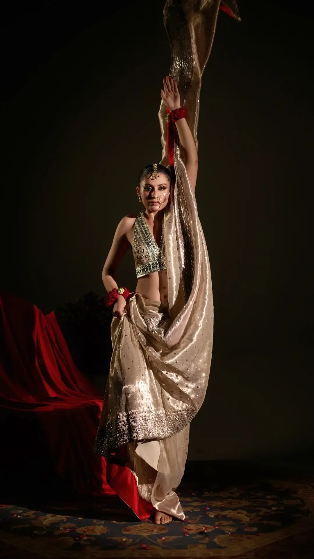 Dancer in a traditional outfit with a dark background